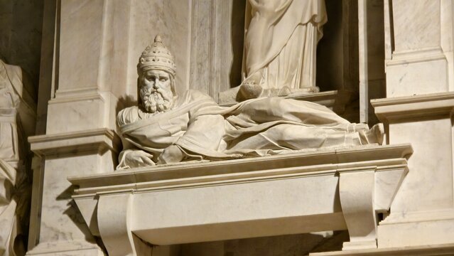 Rome, Italy &ndash; 11 January 2025. Reclining marble figure of Pope Julius II in papal tiara and draped robes atop his tomb monument inside San Pietro in Vincoli, above Michelangelo&rsquo;s Moses.