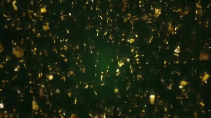 Abstract video of golden confetti falling on a dark green background