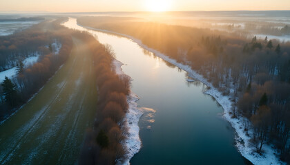 Aerial winter sunrise over teal river, snow-dusted banks, pastel sky — hero banner