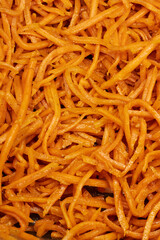 Close-Up of Spicy Korean Carrot Salad &ndash; Fresh Shredded Carrots with Seasoning