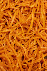 Close-Up of Spicy Korean Carrot Salad &ndash; Fresh Shredded Carrots with Seasoning