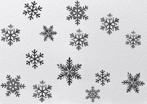 Snow flakes patter on white paper
