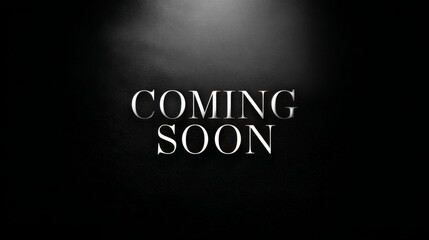 Coming Soon - Elegant serif lettering on black leather background with subtle spotlight from above
