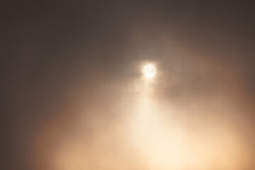 sund with a lot of fog and clouds