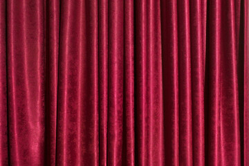 Red velvet theater curtain background.