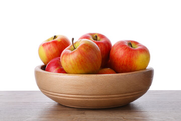 Ripe red apples in bowl on wooden table against white background, closeup