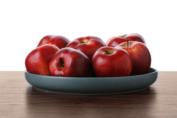 Ripe red apples on wooden table against white background, closeup