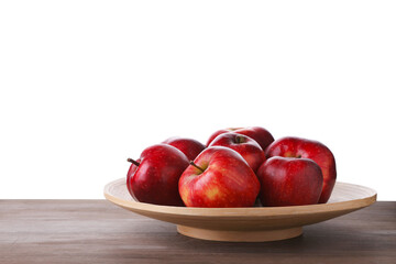 Ripe red apples on wooden table against white background, closeup. Space for text
