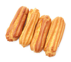Tasty eclairs isolated on white, top view