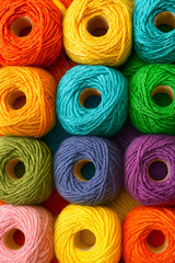 Multicolored sewing threads in a stack