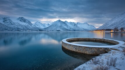 Idyllic Winter Landscape with Mountain Reflections and Serene Lake in Northern Norway