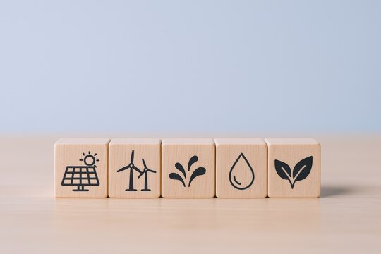 Renewable Energy and Sustainable Resources Represented by Icons on Wooden Blocks for Environmental Awareness
