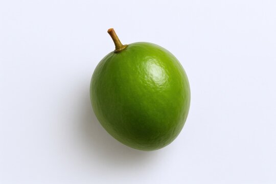 Single Fresh Green Umbu Fruit Close-Up on White Background, Healthy Eating and Ingredient Image