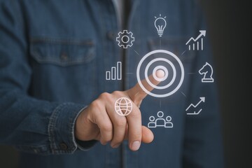 Fototapeta premium Person Touching Virtual Target Interface with Business Strategy and Digital Marketing Icons for Success