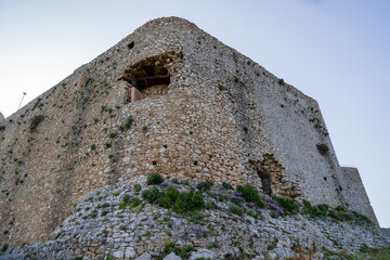 Vew of the defensive walls of Chlemoutsi Castle in Kastro, Peloponnese, Greece, during spring