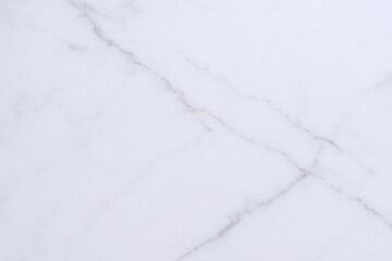 Obraz premium Elegant White Marble Texture Background with Subtle Veining, Perfect for Design Overlays and Mockups