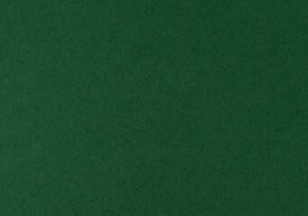 Green textured background with soft felt surface