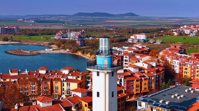 Footage around the top of the Aheloy Lighthouse in Bulgaria. Amazing bright houses are around at the sea coast.