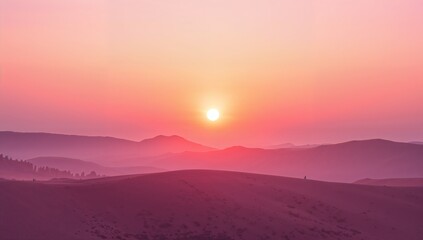 A pink hued sunset over rolling hills with the sun centered in the sky and a soft pink glow