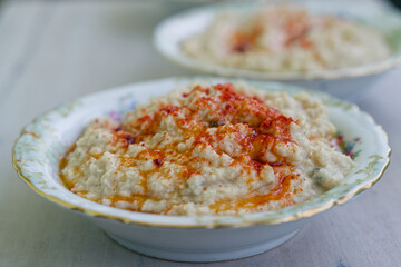 classic hummus preparation, ready to be served as a delicious side dish