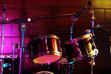 Modern drum kit on stage, closeup. Musical instrument