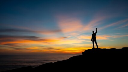 Silhouette of success at sunset overlooking the ocean, celebrating achievement and reaching goals with vibrant colors and a sense of freedom