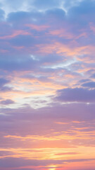 Obraz premium Soft Cloudy Sky with Pastel Sunset Colors - Vertical 4K Dreamy Nature Background
