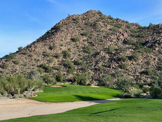 A golf course located in the southwest United States during the winter.