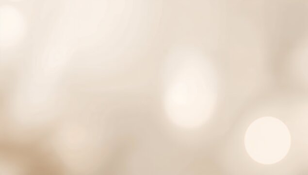 Soft beige background with blurred lights creating a dreamy and ethereal abstract visual texture effect