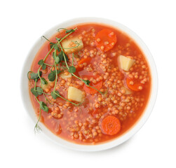 Delicious lentil soup with vegetables in bowl isolated on white, top view