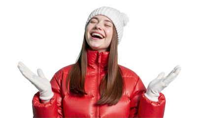 A woman in winter clothing laughs joyfully while enjoying a moment of pure happiness