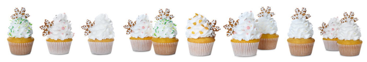 Christmas cupcakes decorated with snowflake cookies isolated on white, set