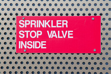 Sprinkler stop valve sign for building fire protection