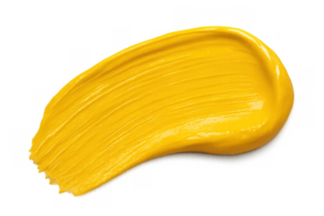 Yellow acrylic paint smear with a thick, vibrant texture. Creating a bold brush stroke for abstract art and design elements