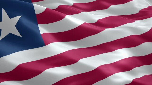 Waving national flag of liberia, showcasing its vibrant red and white stripes with a single white star on a blue canton, a symbol of freedom and national sovereignty.