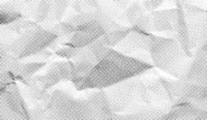 Halftone crumpled paper texture with a dotted, rough, and wrinkled surface. Black creased sheet background in comic pop-art style, featuring grainy folds and gritty distressed details.