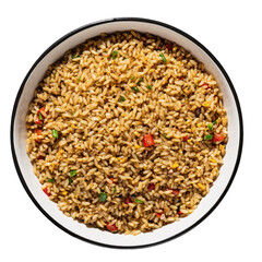A top down view of a white bowl filled with delicious fried rice with visible pieces of red bell pepper and green herbs on a black background