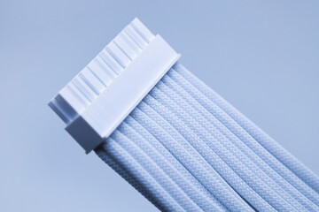 White 24-pin connector. Connecting power to the computer motherboard.