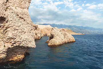 Aerial view of sea waves and fantastic rocky shore, photo with seascape for background. Clear sea water in the mountains. France