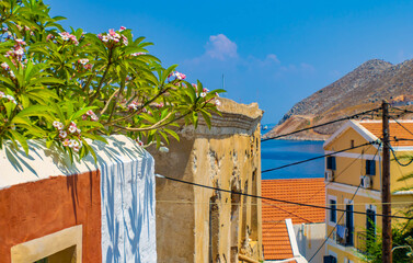 Landscape view on the sea ver the roofs from the hill, Symi town, Greece
