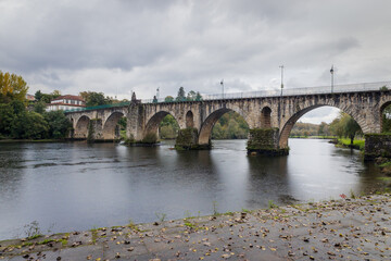 Ponte da Barca bridge over Lima river. Ancient portuguese village.