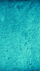 macro photo of blue brick with visible texture. background