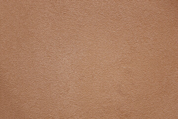 Fototapeta premium rough sand red pink peach fuzz stucco texture, detailed grainy surface look Beige Textured Surface Background with Grainy Detail and Subtle Variations for Creative Projects and Graphic Design Purposes