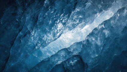Interior view of a glacial ice cave with blue and white illuminated textures