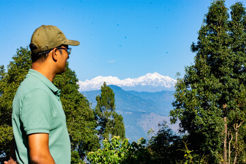 Young Man Admiring Majestic Kanchenjunga from Kalimpong Hills