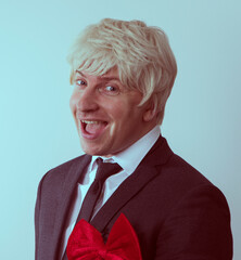 Portrait of handsome smiling young man looking to the side. Man photo. People. Male. Background. Happy. Holidays.