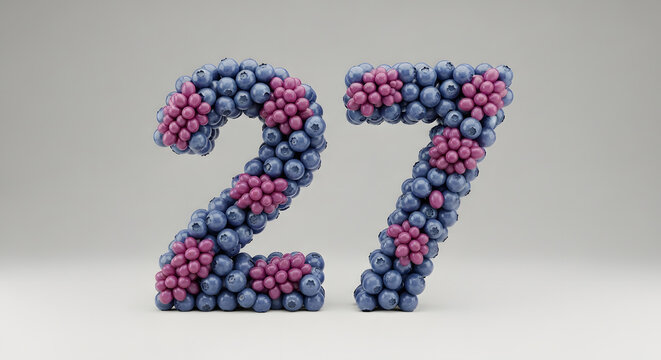 Number twenty-seven crafted from fresh, colorful berries on a clean white background