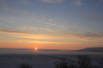 Crisp and Cold Sunrise in the Fog Covered Valley.