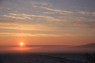 Crisp and Cold Sunrise in the Fog Covered Valley.