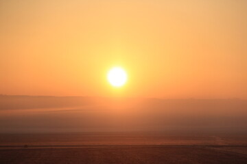 March 21, 2019 sunset in the fog from country to city scenes.